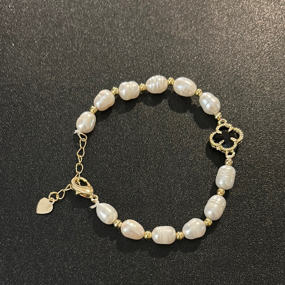 Genuine pearl gold bracelet with black crystal clover charm